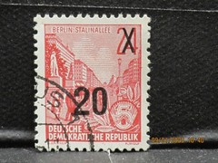 The listing:(1)1954 East Germany Berlin Stalinalle 24 overprint 20 Pfg Stamp-LH