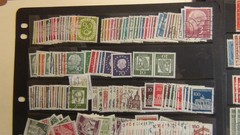 Stampsweis Germany Bund loaded collection on black stock est many 100s stamps
