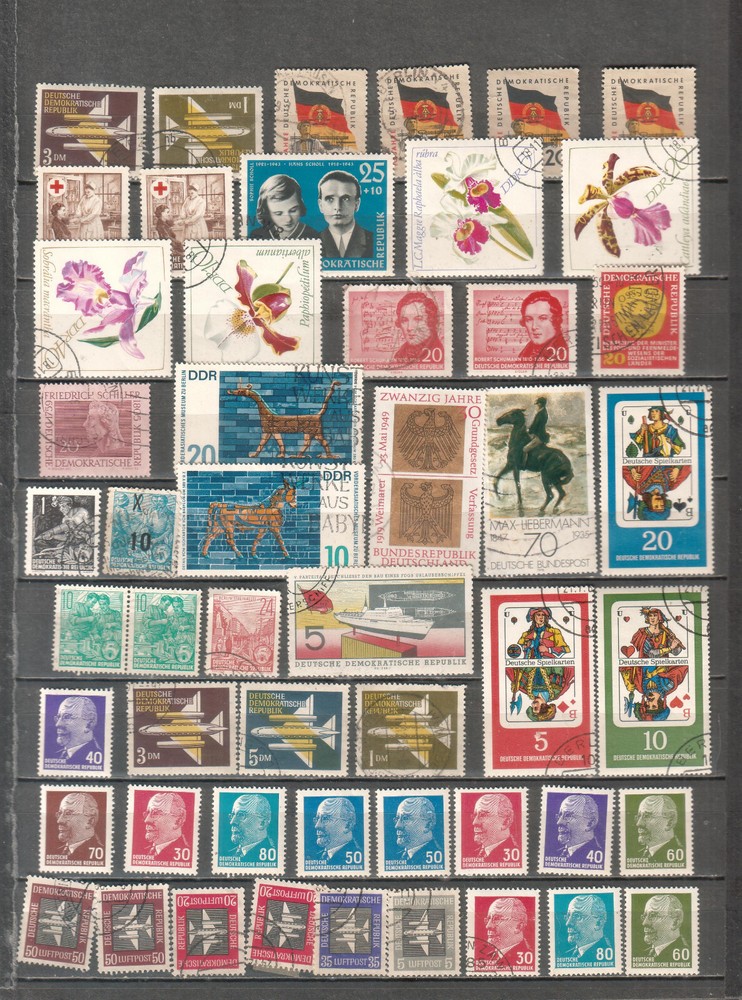 Germany DDR lot of 51 MNH MH and used stamps cancels dates locations