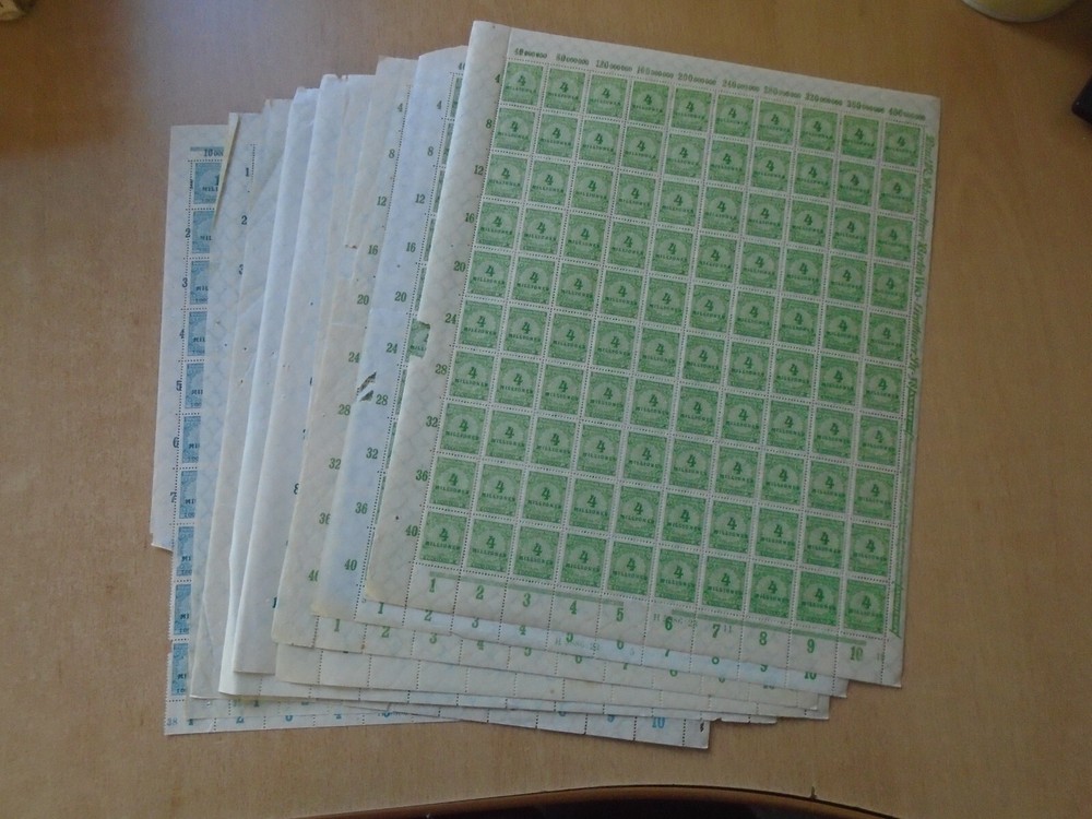 Germany: SG316 1M DM blue & SG318 4M DM green. 9 x 1920s sheets of 100 stamps.
